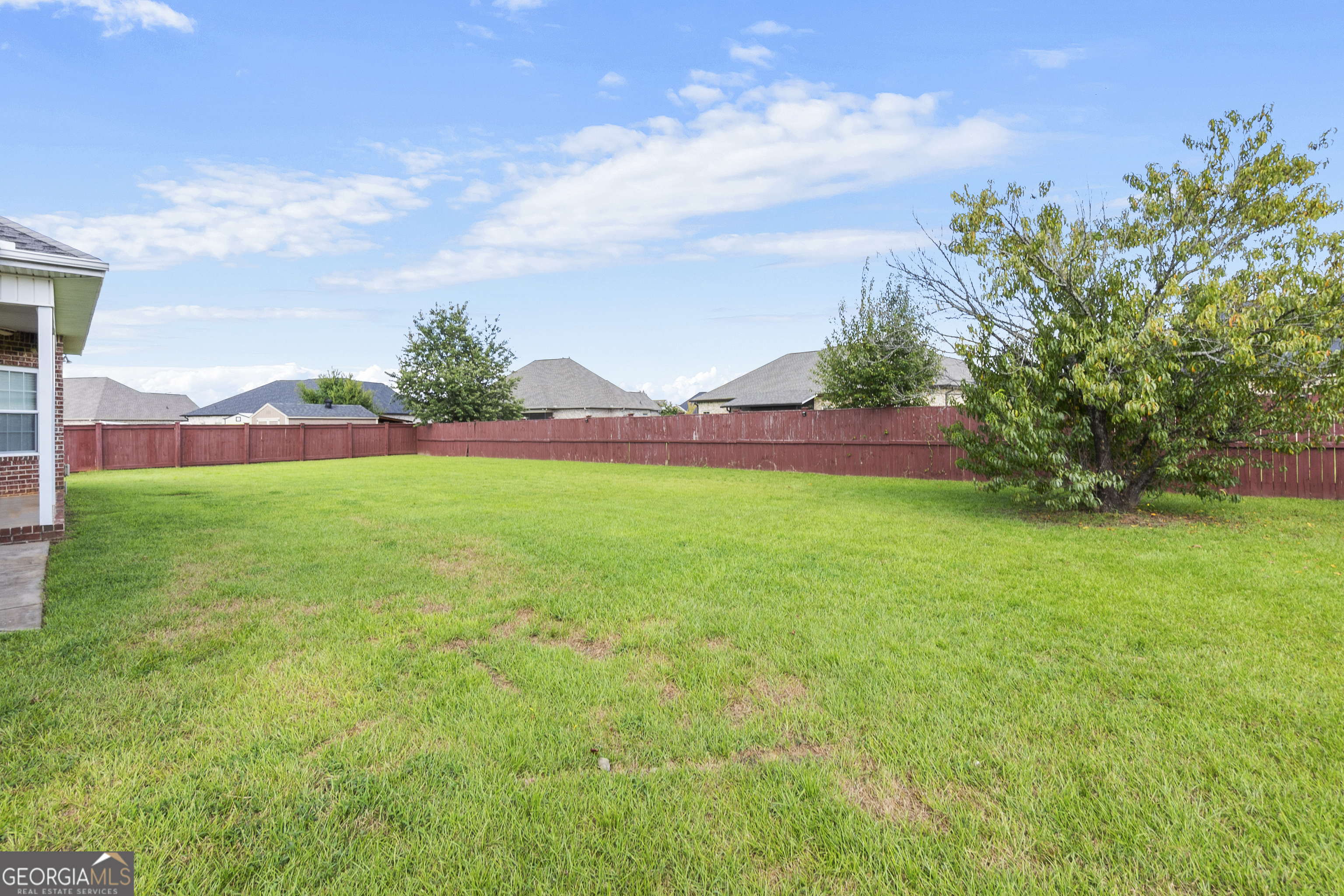 217 Caleb Way Byron, GA 31008 - Photo 49 of 58 a view of yard with swimming pool and green space