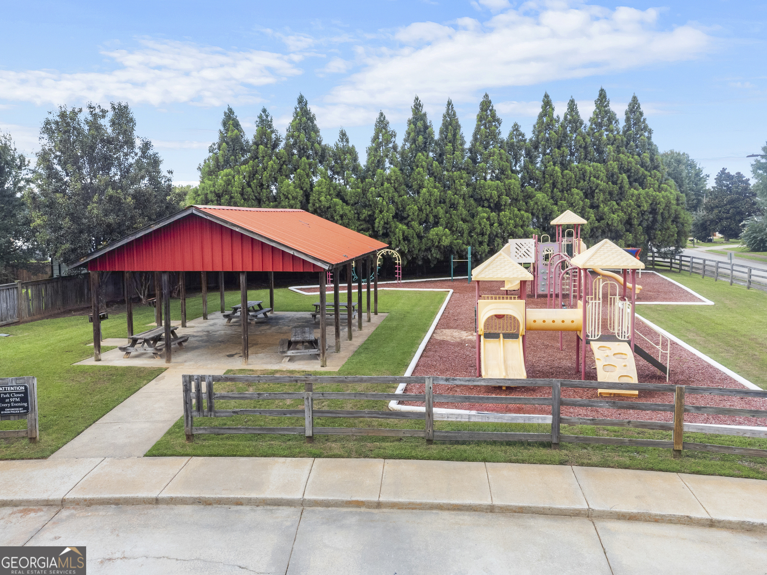217 Caleb Way Byron, GA 31008 - Photo 58 of 58 a aerial view of a house with a yard and sitting area