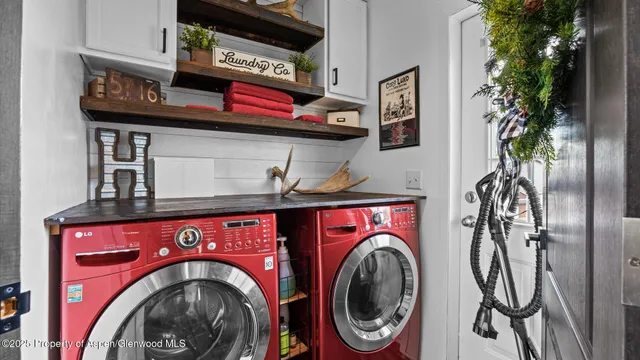 a utility room with dryer and washer