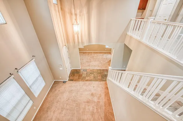 a view of entryway with wooden floor and door