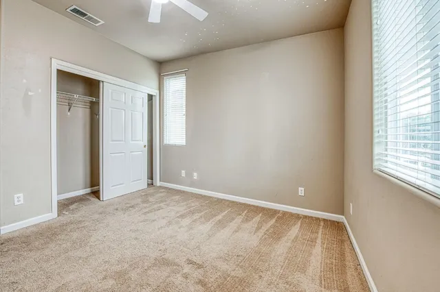 an empty room with a natural light