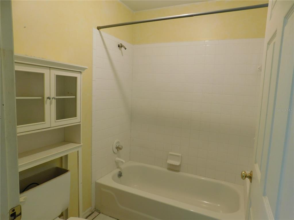 5821 Buck Run Drive Lakeland, FL 33811 - Photo 20 of 30 a bathroom with a shower and a toilet