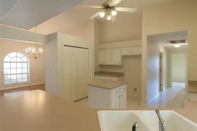 a view of a kitchen cabinets and a wooden floor