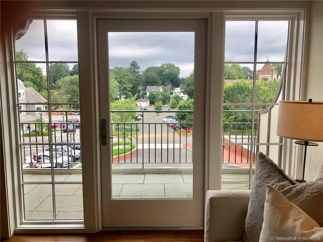 a view of a room with a large window