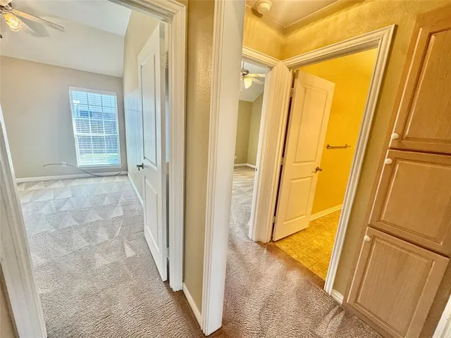 a view of empty room with a fireplace