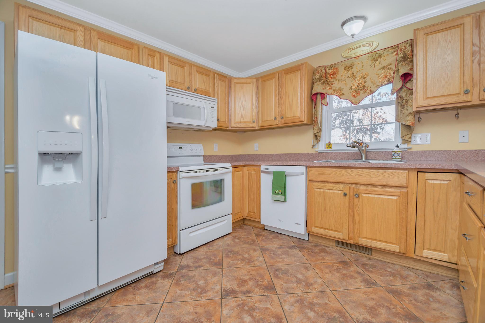 200 Freedom Road Locust Grove, VA 22508 - Photo 12 of 30 Bright white appliances make a kitchen feel fresh