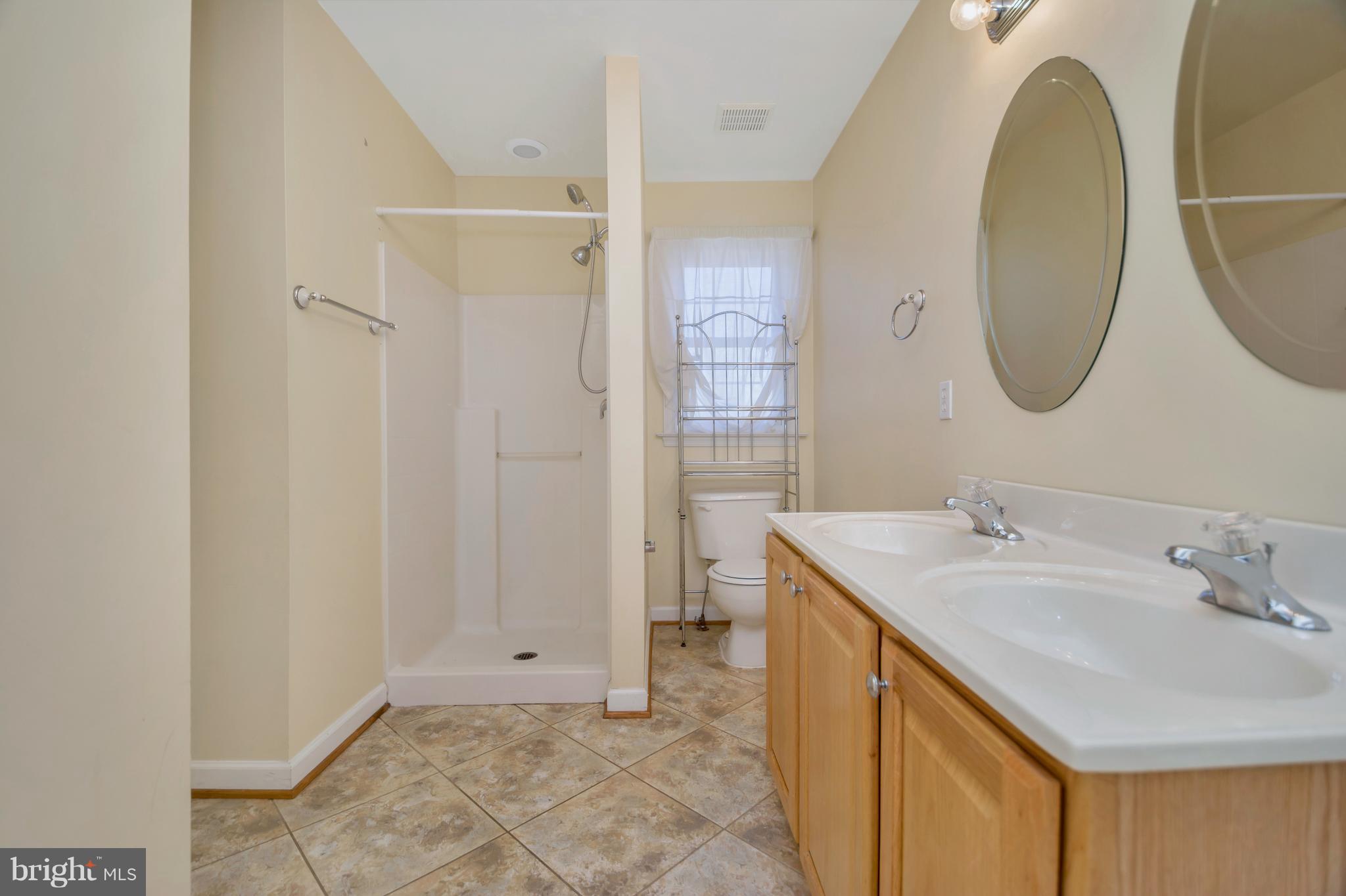 200 Freedom Road Locust Grove, VA 22508 - Photo 21 of 30 Separate tub and shower, ceramic floors.