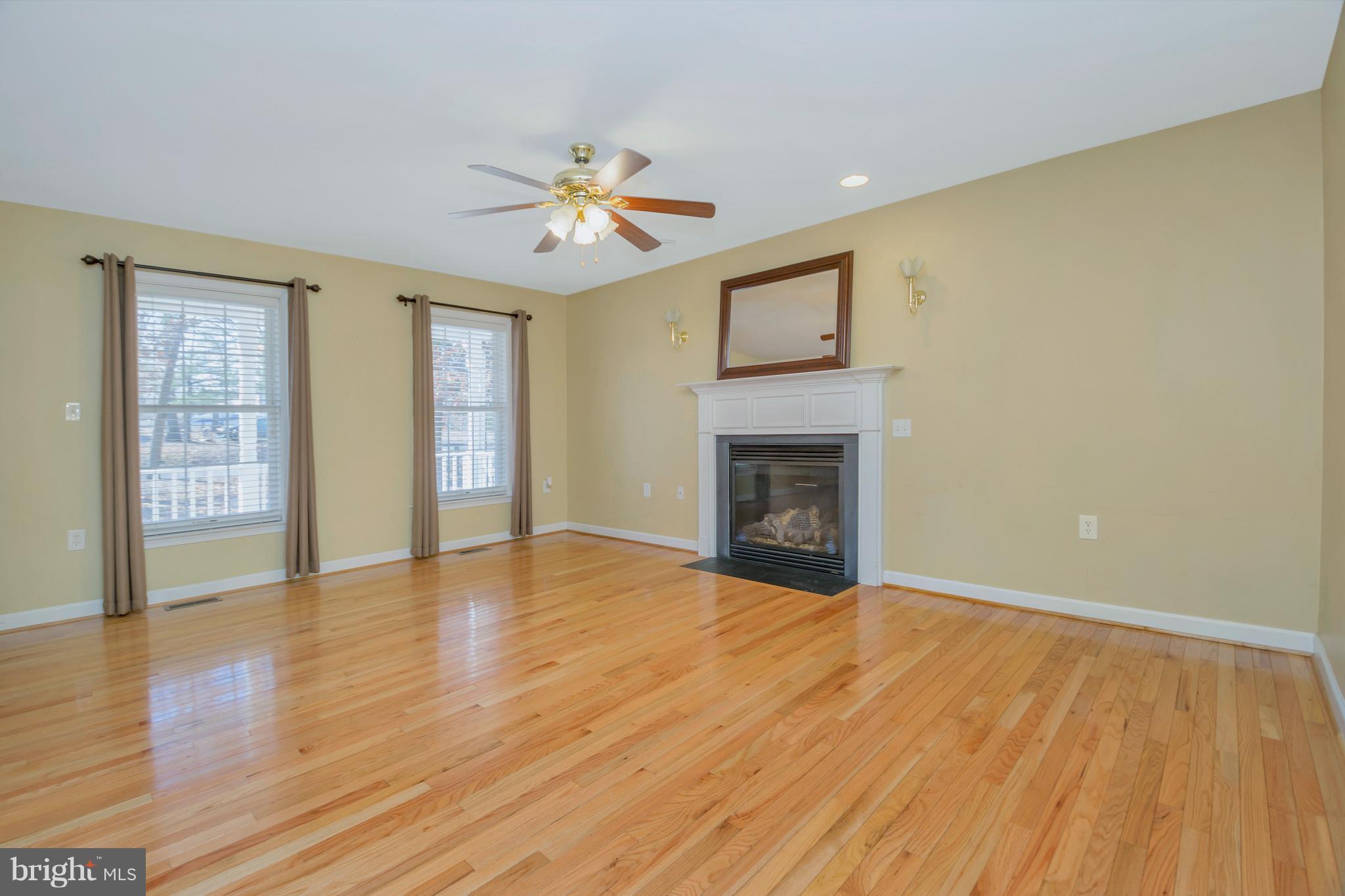 200 Freedom Road Locust Grove, VA 22508 - Photo 7 of 30 Cozy fireplace and gleaming wood floors!