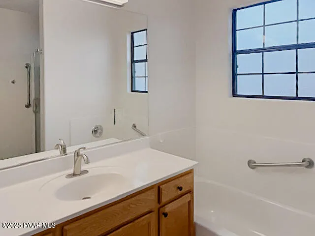a bathroom with a sink and a bathtub