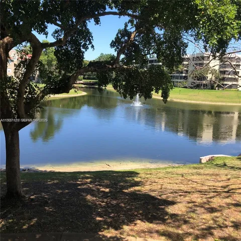 a view of a lake from a yard