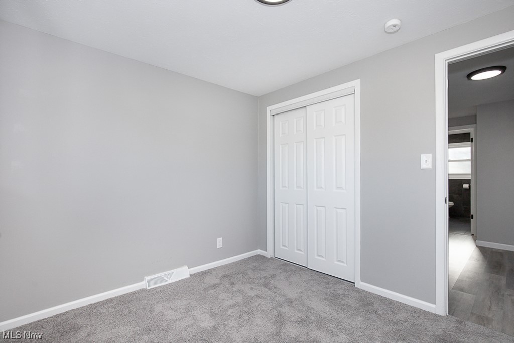 30892 Roosevelt Road Wickliffe, OH 44092 - Photo 8 of 22 First bedroom with carpet