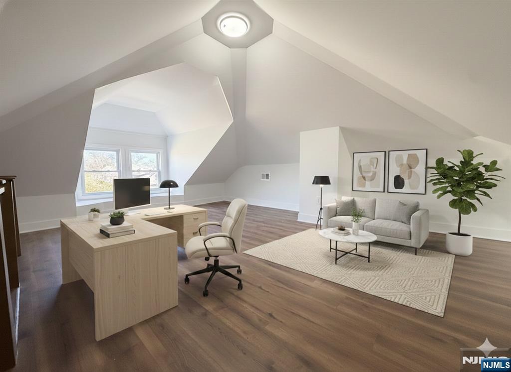 93 May Street Hawthorne, NJ 07506 - Photo 11 of 21 a living room with furniture and a table