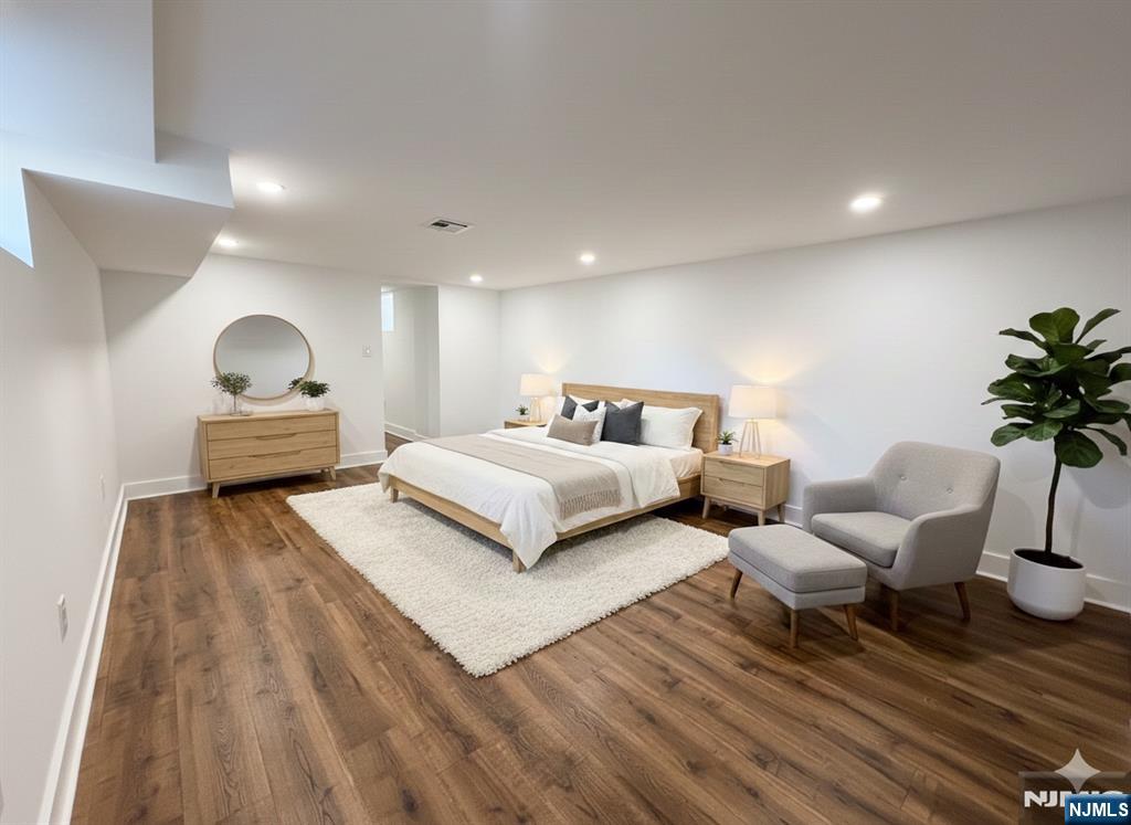 93 May Street Hawthorne, NJ 07506 - Photo 17 of 21 a bedroom with a bed and window