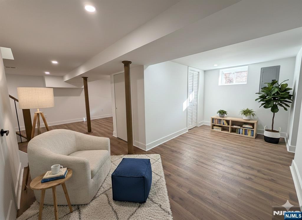 93 May Street Hawthorne, NJ 07506 - Photo 18 of 21 a living room with furniture and a wooden floor