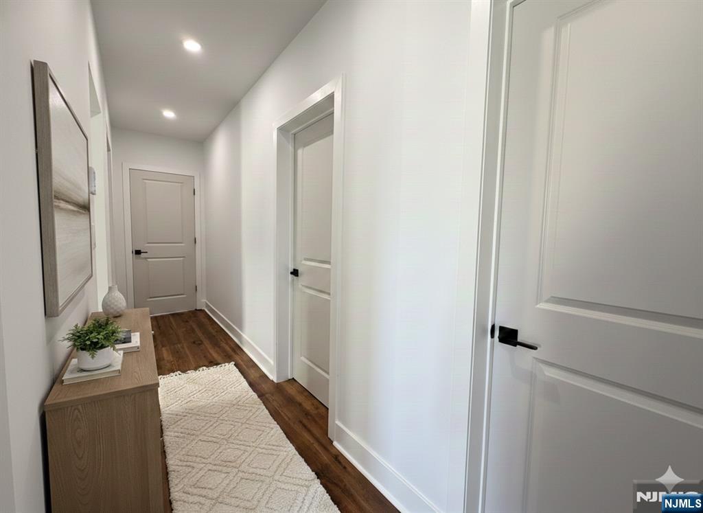 93 May Street Hawthorne, NJ 07506 - Photo 10 of 21 a view of hallway with wooden floor