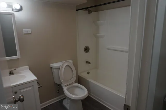 an empty room with a bathroom