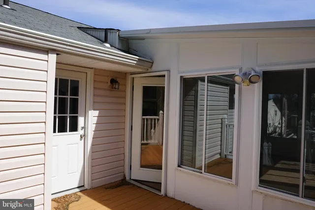 a view of a house with a door and a window