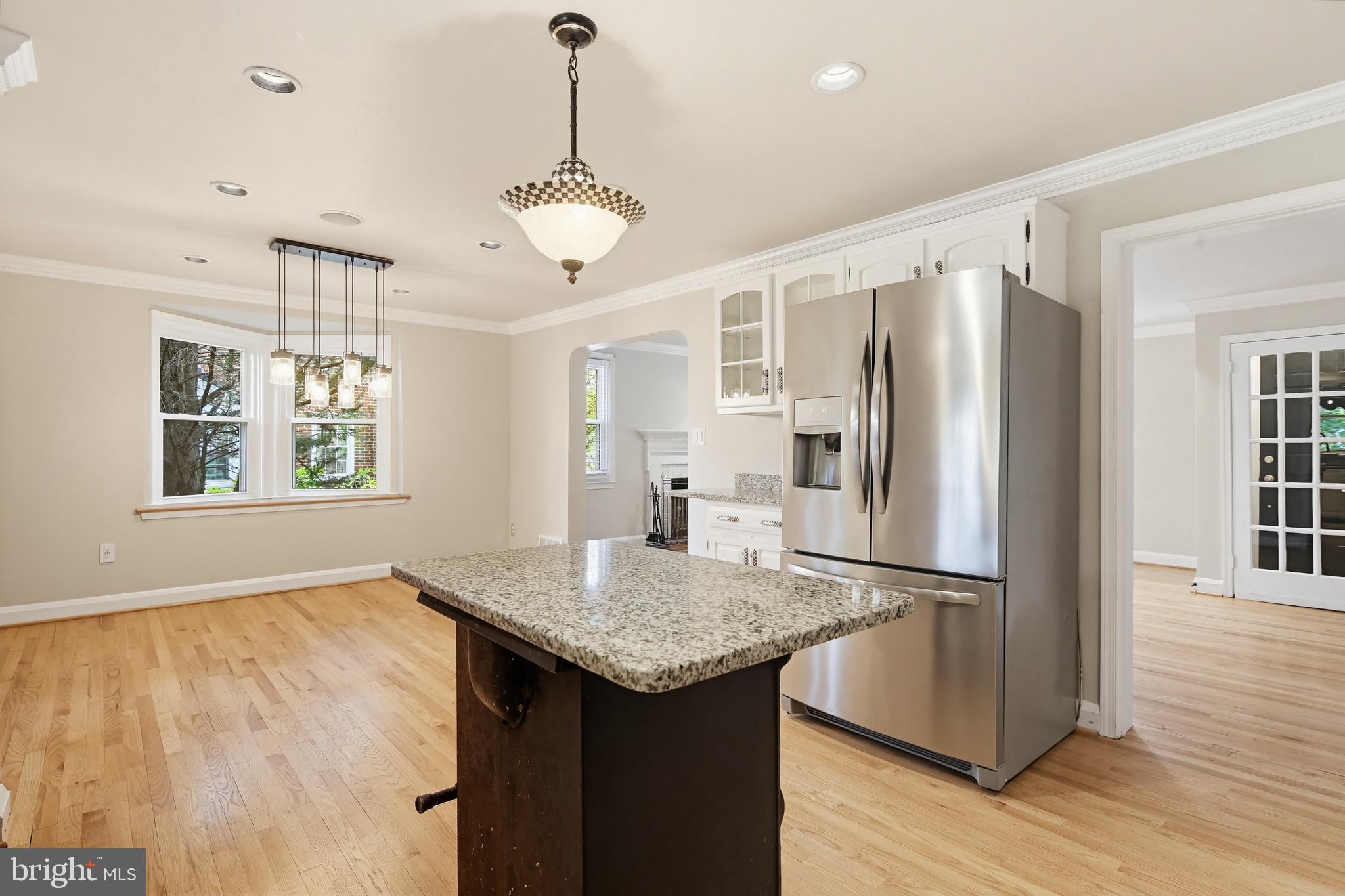 8111 Barksdale Road Baltimore, MD 21286 - Photo 12 of 39 a kitchen with stainless steel appliances granite countertop a refrigerator and a sink