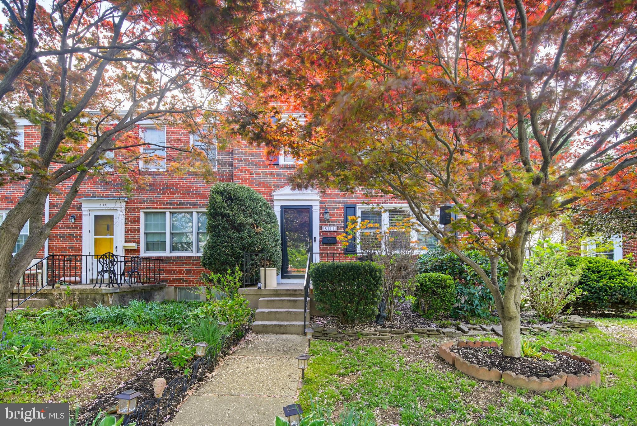 8111 Barksdale Road Baltimore, MD 21286 - Photo 2 of 39 a front view of a house with a yard