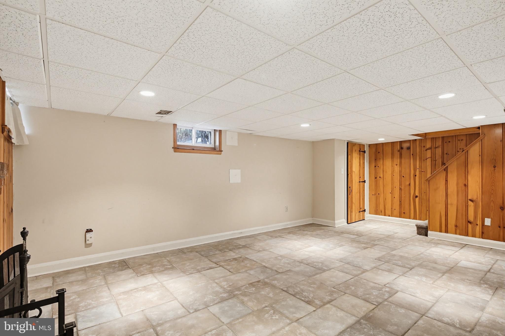 8111 Barksdale Road Baltimore, MD 21286 - Photo 24 of 39 a view of an empty room with a window