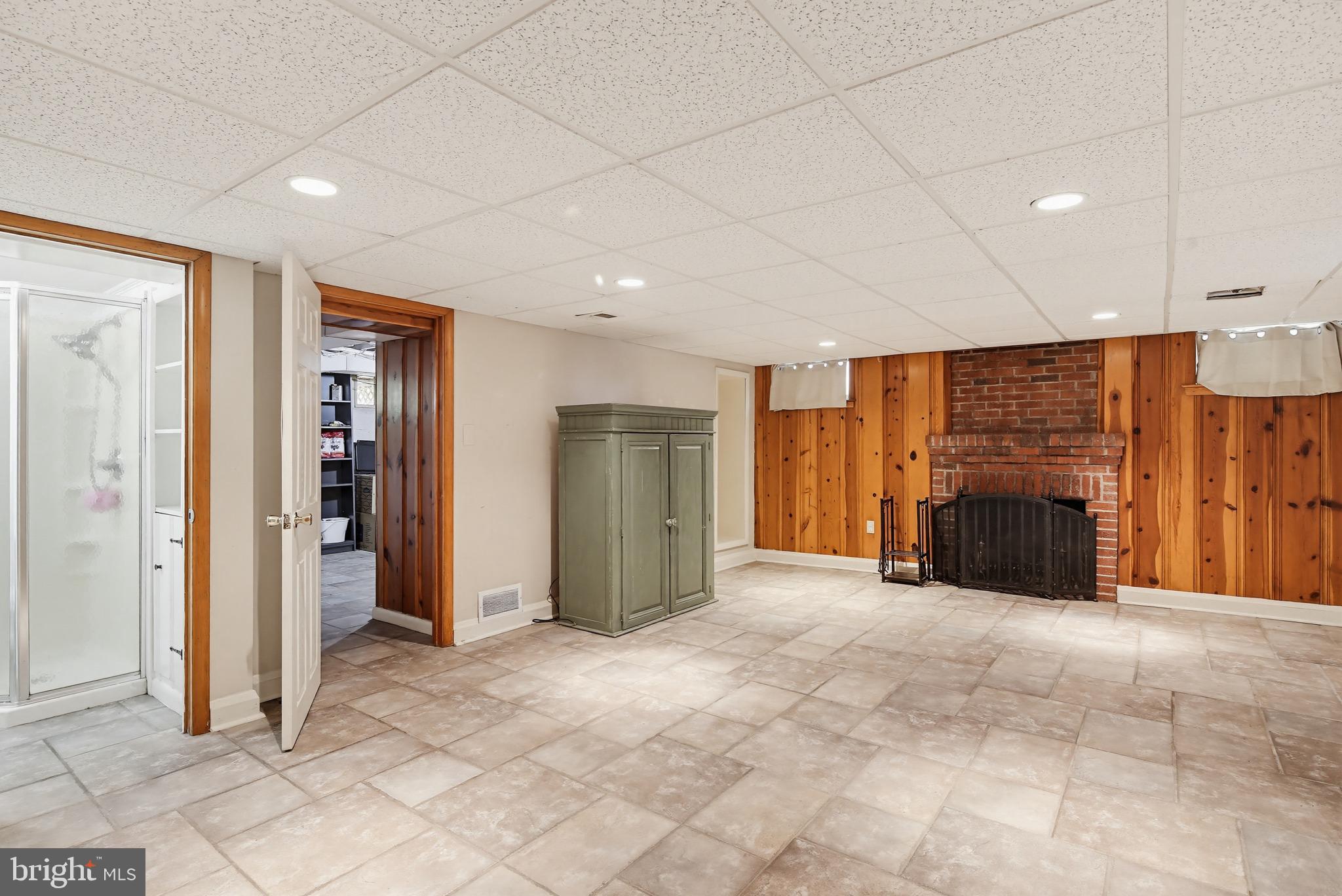 8111 Barksdale Road Baltimore, MD 21286 - Photo 25 of 39 a view of an empty room with a fireplace