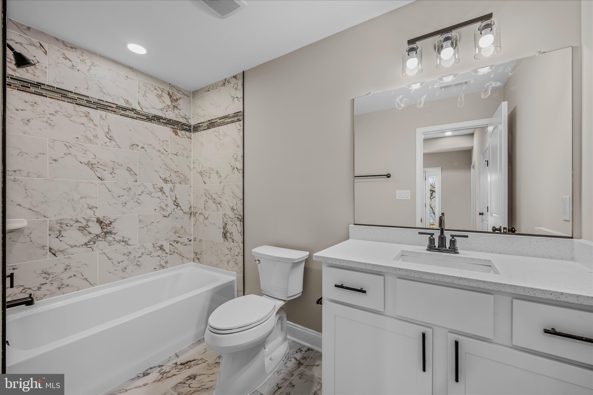 191 Shenandoah Ranch Road Harpers Ferry, WV 25425 - Photo 15 of 53 a bathroom with a sink toilet vanity and shower