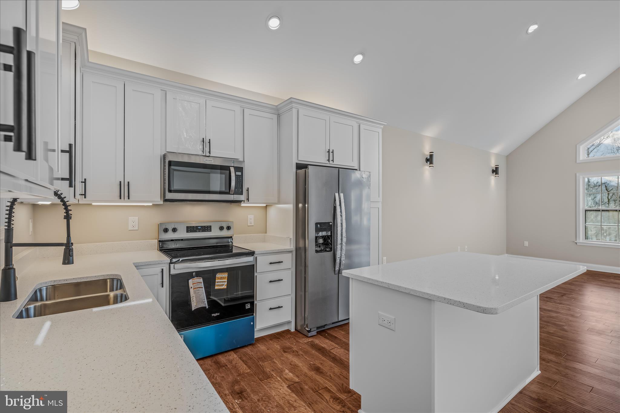 191 Shenandoah Ranch Road Harpers Ferry, WV 25425 - Photo 22 of 53 a kitchen with stainless steel appliances a refrigerator stove microwave and sink