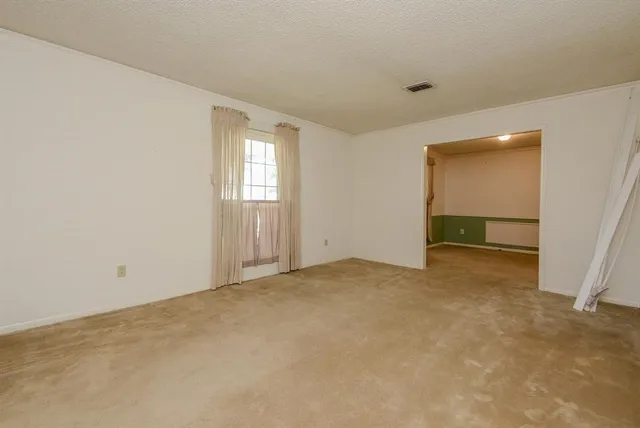 an empty room with a window