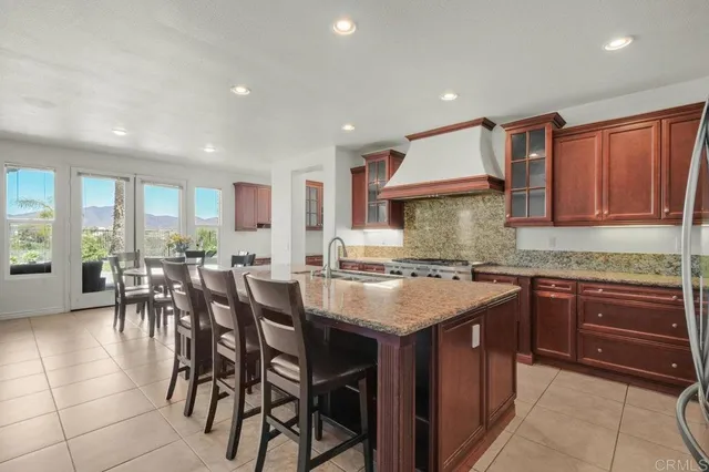 a bedroom with a bed and a tv