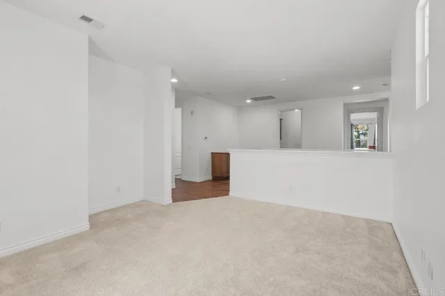 a view of a city with mountains in the background