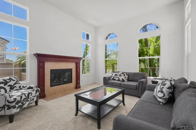 a view of staircase with wooden floor and a rug