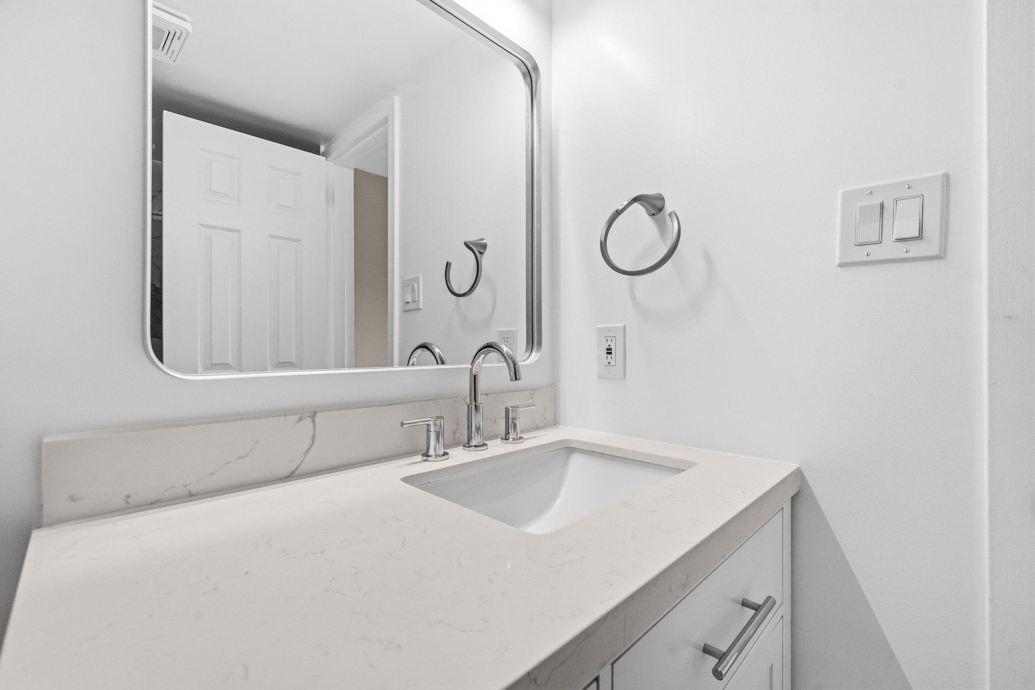 7973 Riggs Road, Unit 1 Hyattsville, MD 20783 - Photo 19 of 24 Primary bathroom sleek modern bathroom oasis.