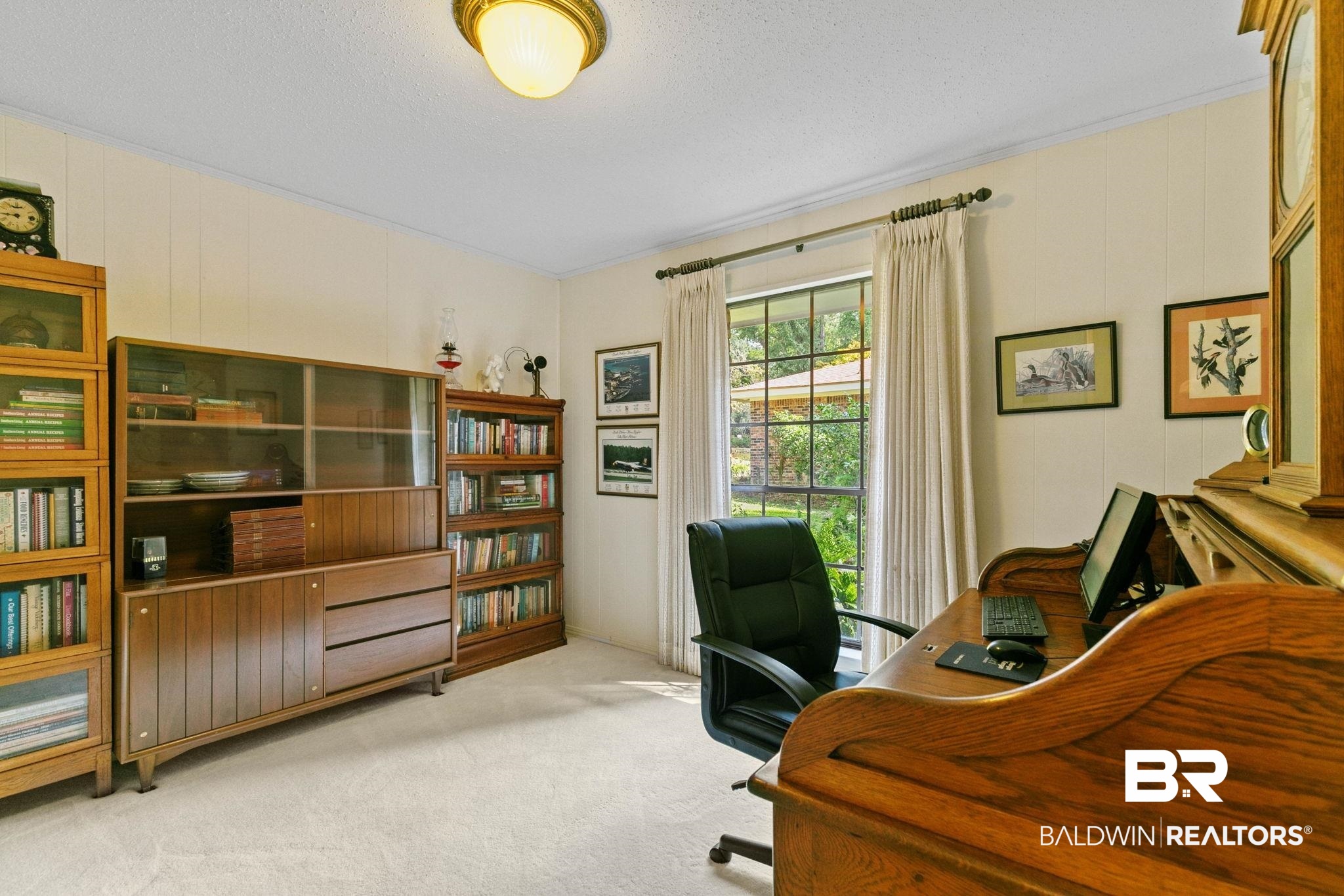 752 Evergreen Street Fairhope, AL 36532 - Photo 33 of 100 Carpeted office space featuring ornamental molding, a textured ceiling, and wooden walls