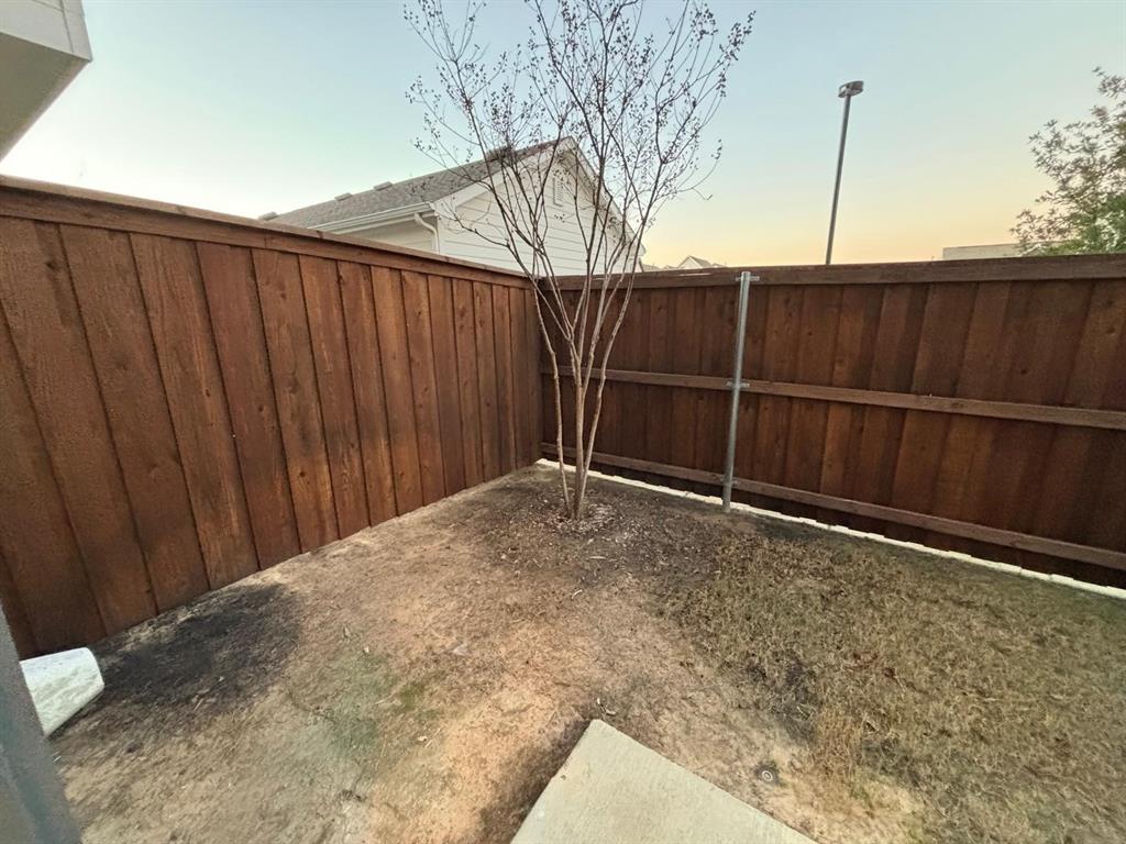 825 West Mayfield Road, Unit 115 Arlington, TX 76015 - Photo 24 of 25 a view of a backyard