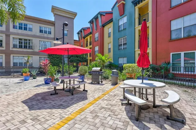a view of a building with sitting area