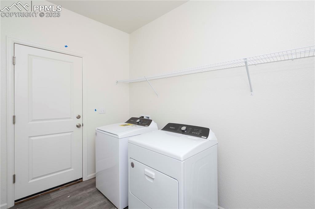 210 Felicity Loop Castle Rock, CO 80109 - Photo 12 of 27 a utility room with dryer and washer