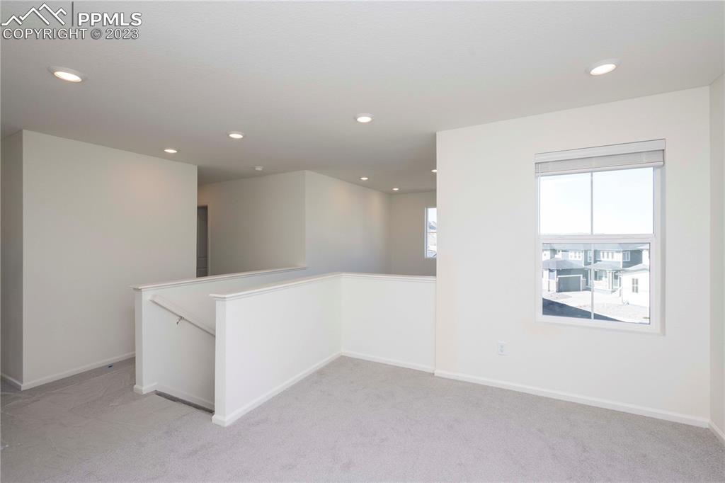 210 Felicity Loop Castle Rock, CO 80109 - Photo 14 of 27 a view of an empty room with a window
