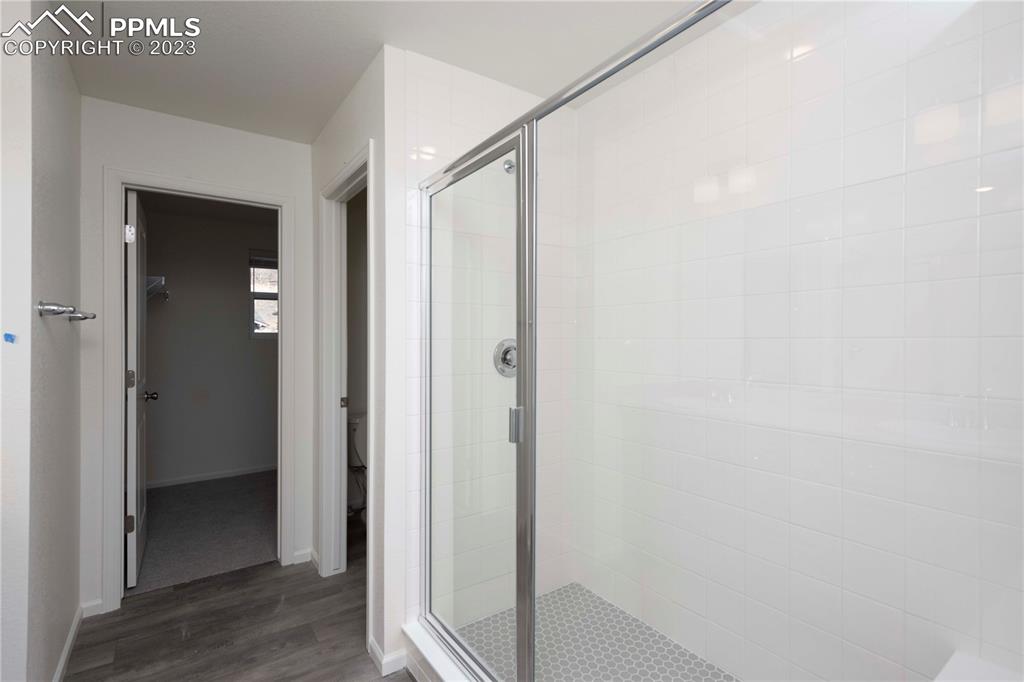 210 Felicity Loop Castle Rock, CO 80109 - Photo 18 of 27 a view of a bathroom from a hallway