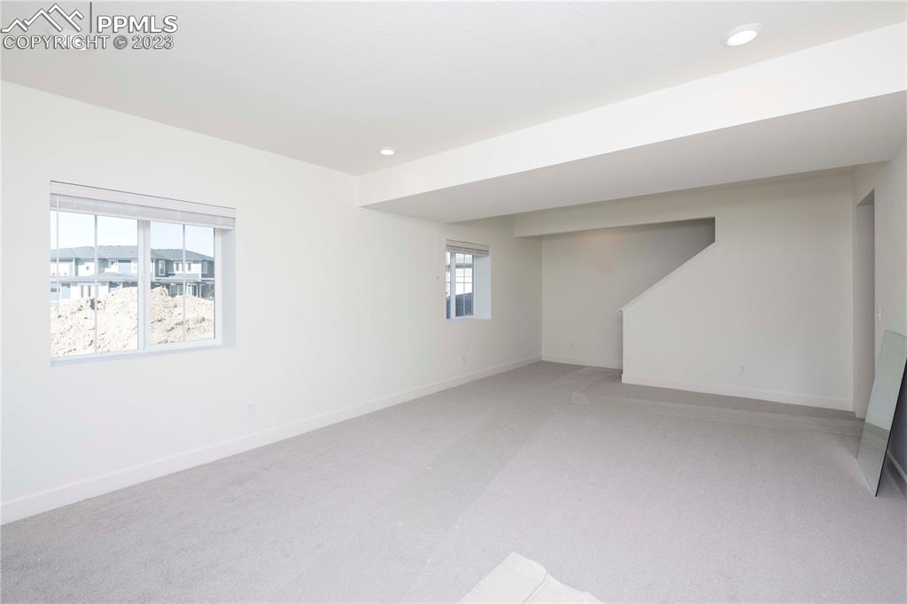 210 Felicity Loop Castle Rock, CO 80109 - Photo 21 of 27 a view of an empty room with a window