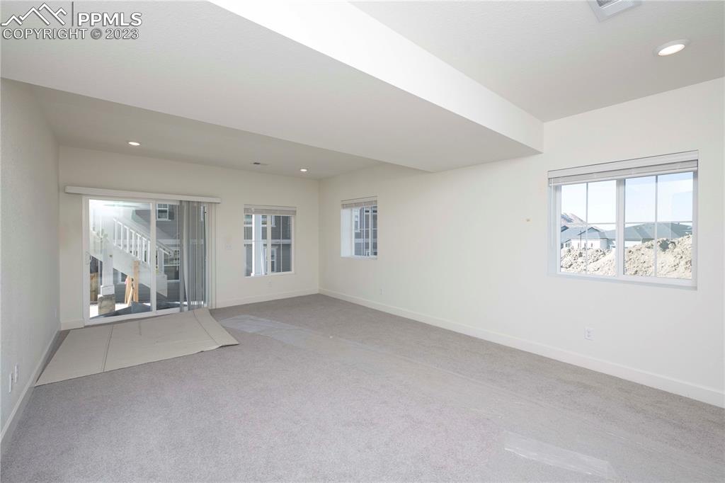 210 Felicity Loop Castle Rock, CO 80109 - Photo 22 of 27 an empty room with windows