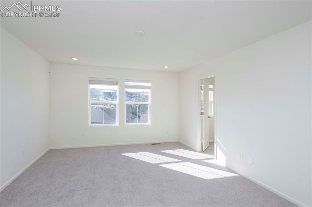 210 Felicity Loop Castle Rock, CO 80109 - Photo 23 of 27 an empty room with a window