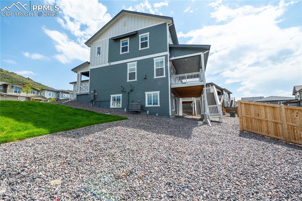 210 Felicity Loop Castle Rock, CO 80109 - Photo 26 of 27 a front view of a house with garden