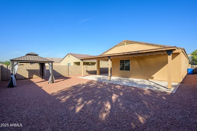 a view of backyard of house