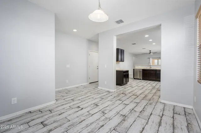 a view of a kitchen with furniture and a fireplace