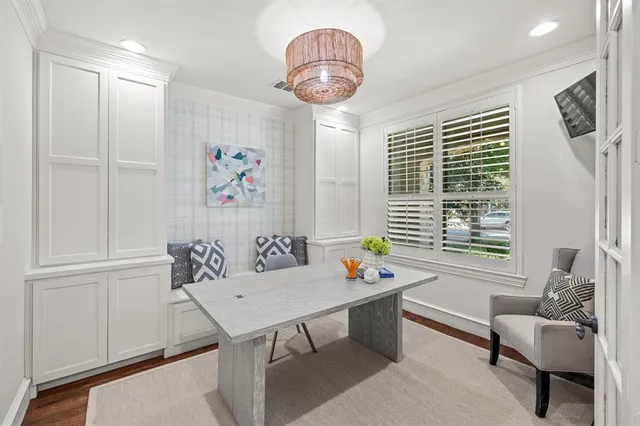 a view of a livingroom with furniture and window