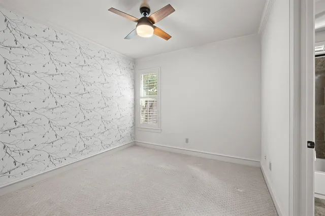 a view of a livingroom with furniture and garden