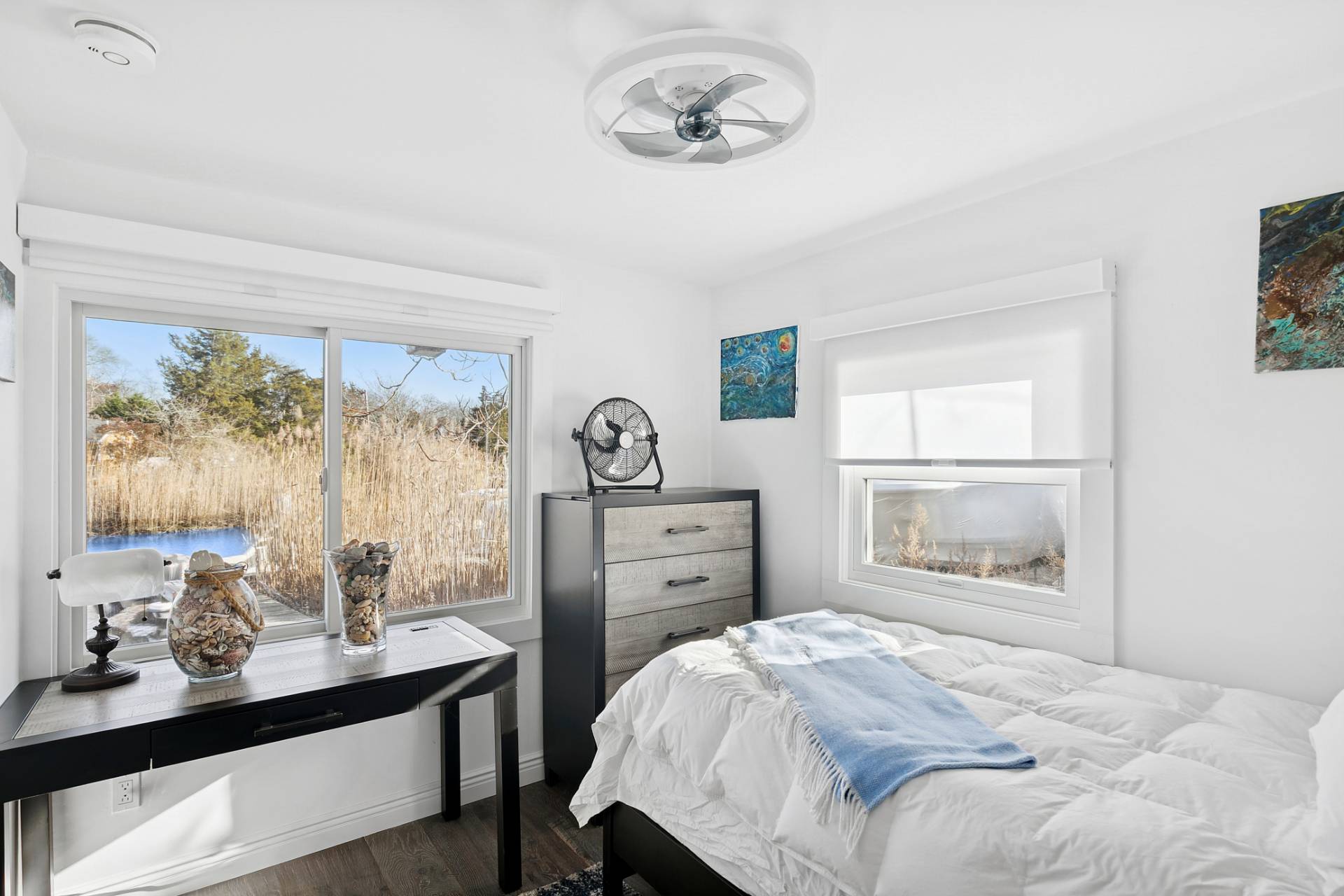 1840 North Sea Road Southampton, NY 11968 - Photo 6 of 7 a bedroom with a bed and a window