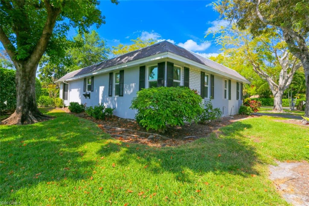 View of home's exterior with a lawn