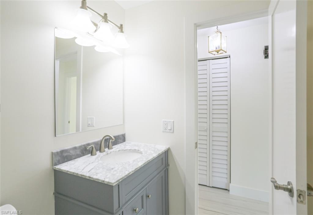 225 Georgetown Boulevard Naples, FL 34112 - Photo 29 of 37 Bathroom featuring vanity