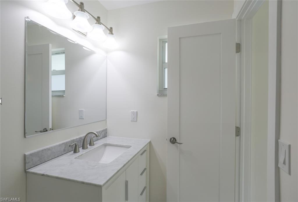 225 Georgetown Boulevard Naples, FL 34112 - Photo 34 of 37 Bathroom featuring vanity